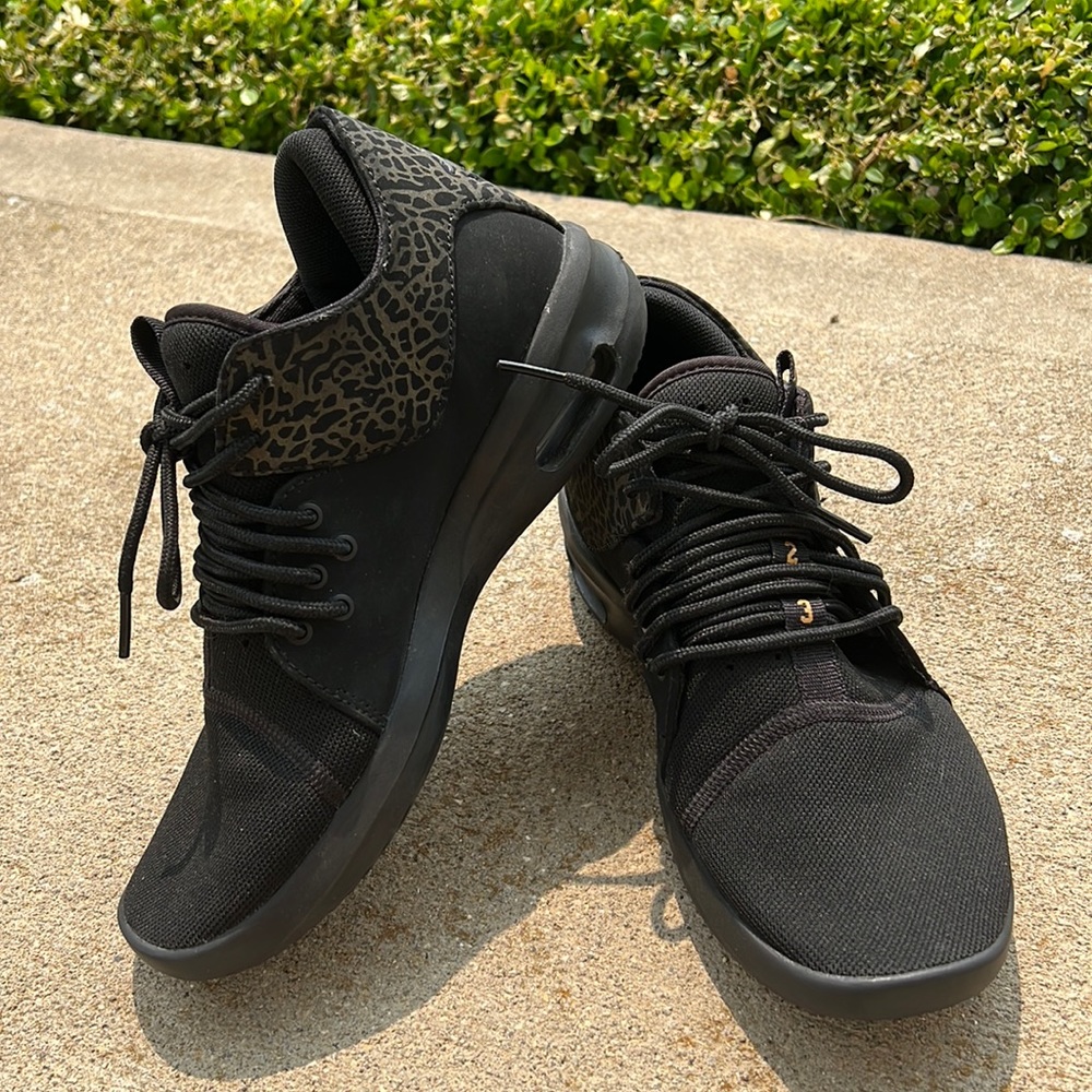 Nike Women’s All-Black Sneaker with Subtle Leopard Accent